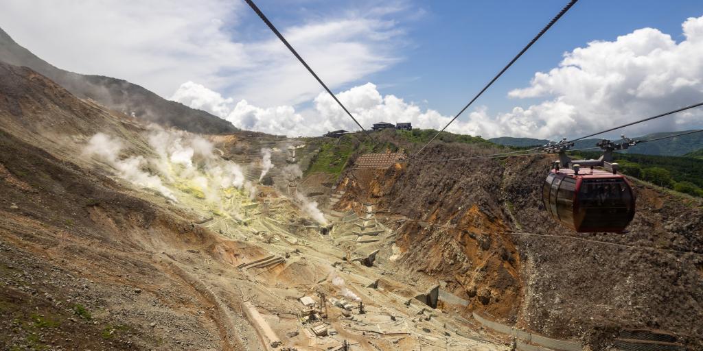 A cable car above active hot springs in Hakone, Japan 