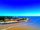 A panoramic view of a pentagon-shaped Fort Gaines along Mobile Bay in Dauphin Island, Alabama, USA, in fair weather