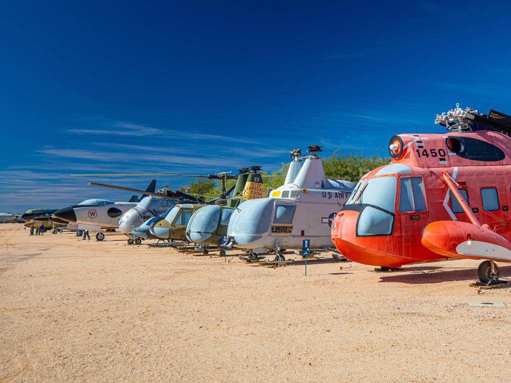 Historic planes and helicopters lined up across the beachfront at Pima Air & Space Museum