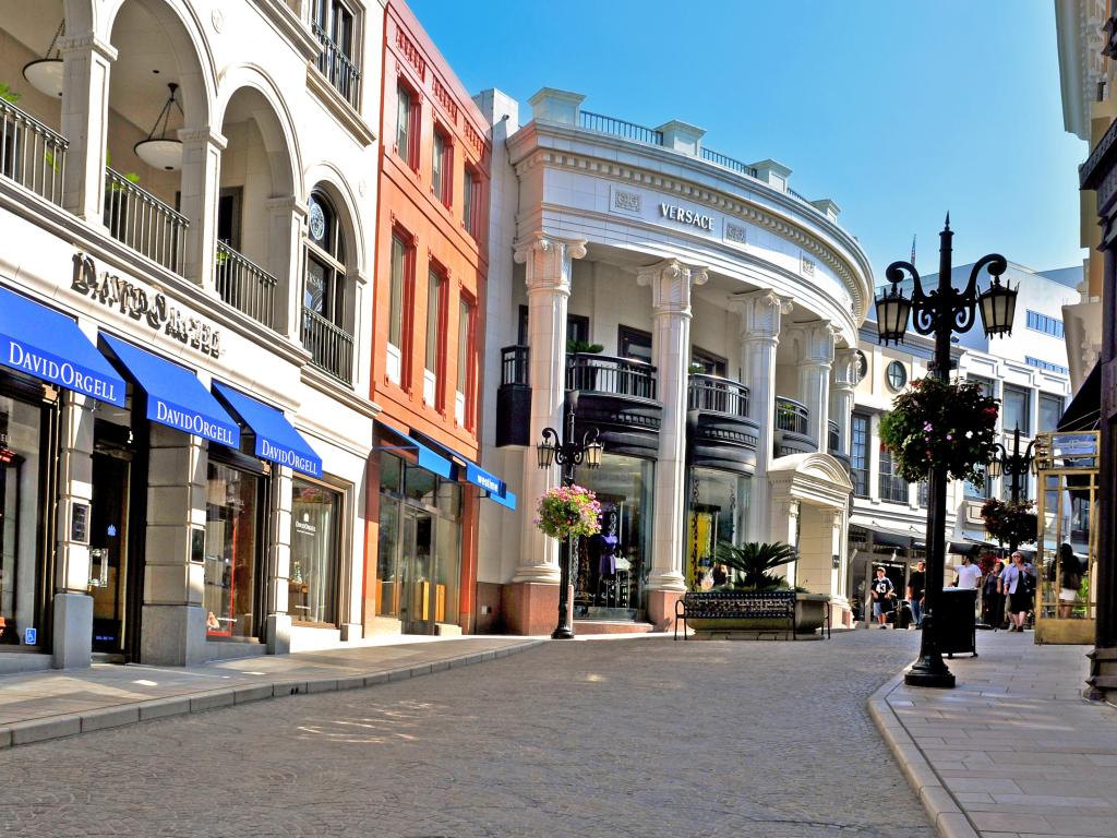 Luxurious boutiques lining the street on a sunny day