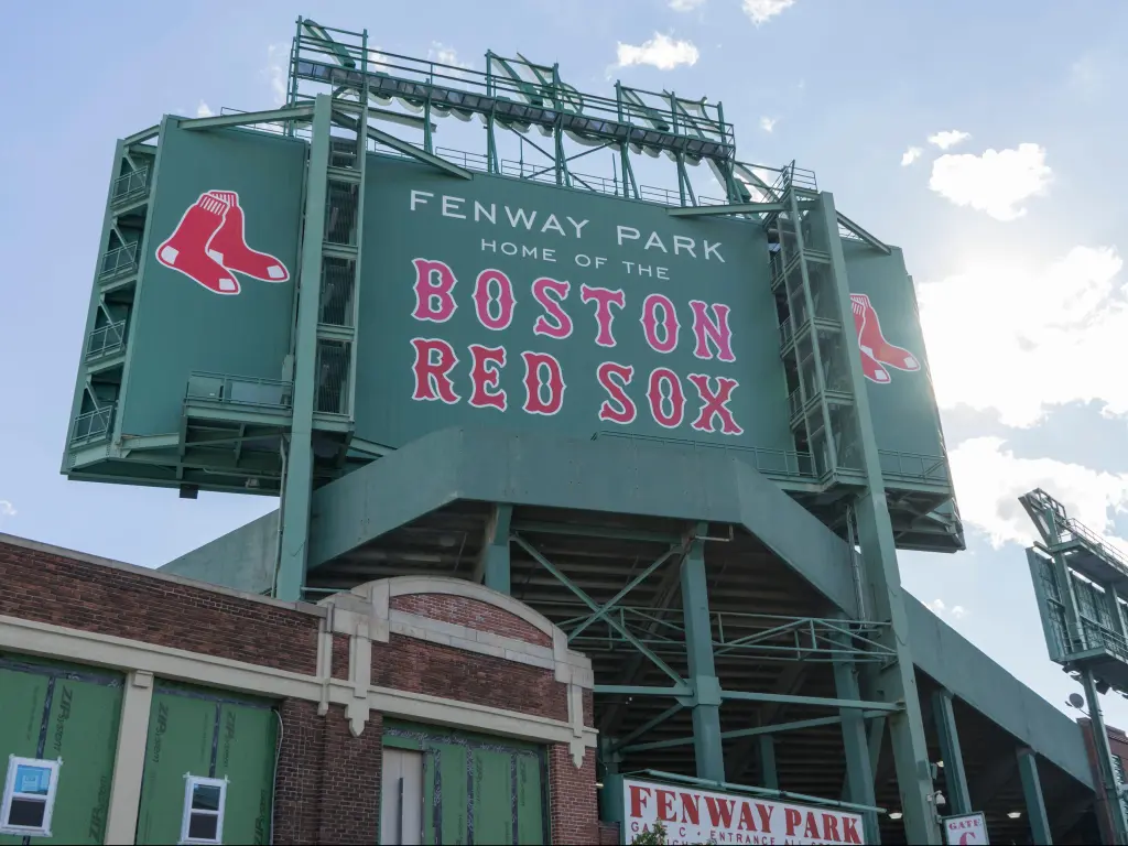 Historic "Boston Red Sox" at their home ground of Fenway Park. Green sign with red text