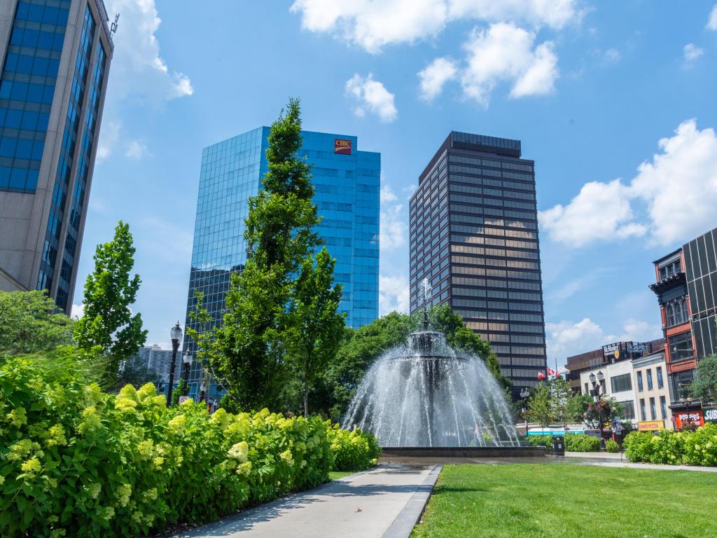 Hamilton, Ontario, Canada with a fountain found in Gore Park in downtown Hamilton right across from Jackson Square mall taken on a sunny day.