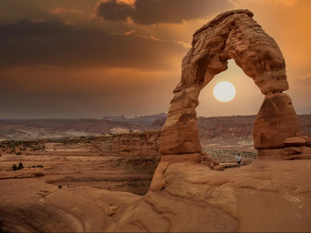 Arches National Park, Moab, USA with a view of the Double Arch Canyon at sunset.