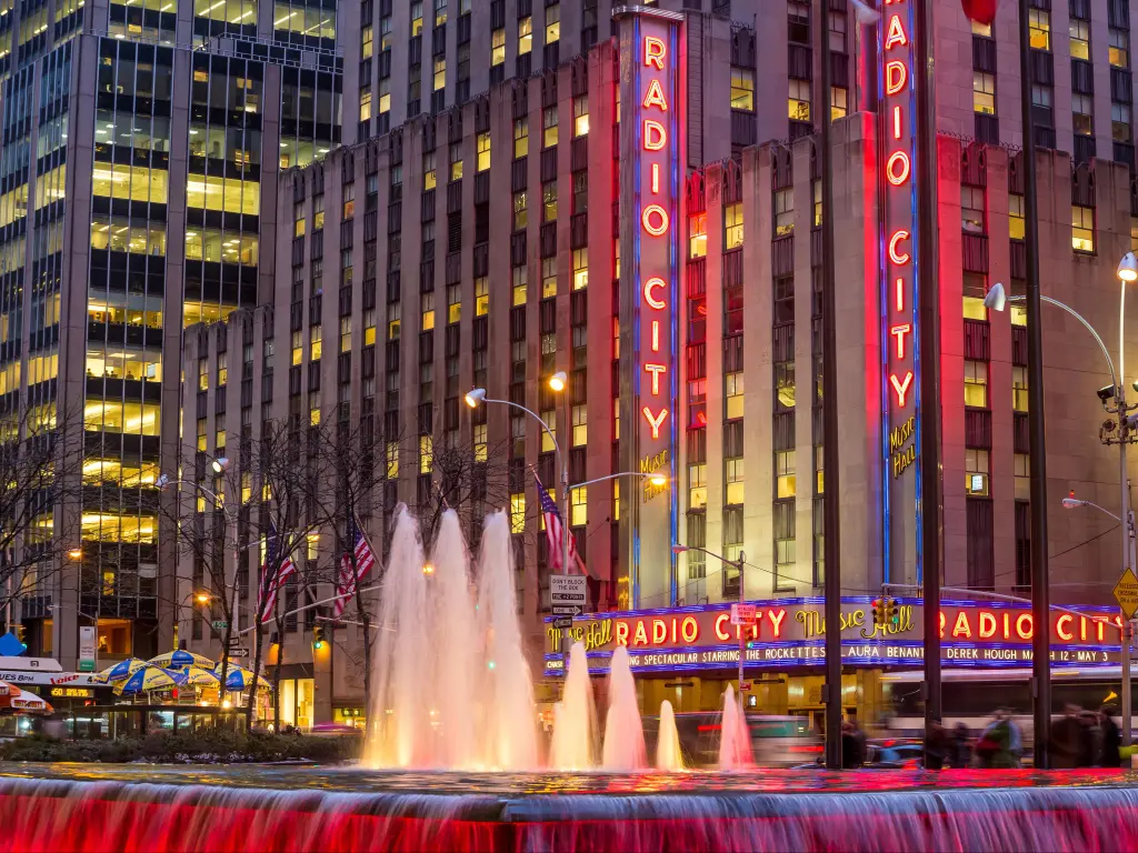 Bright lights and sign of Radio City Music Hall at Rockefeller Center
