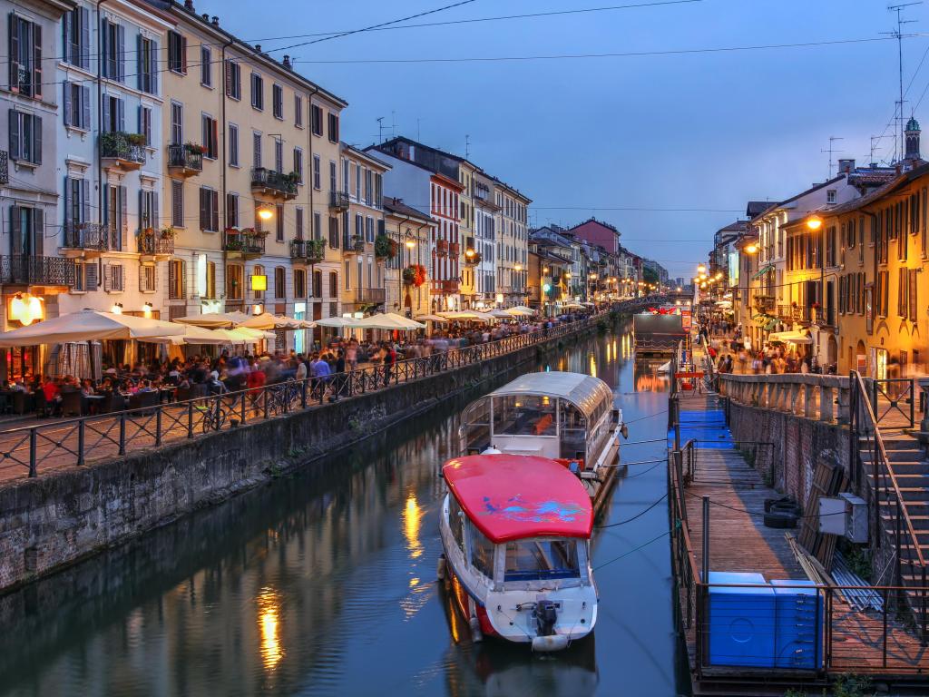 Evening scene along the Naviglio Grande canal in Milan, Italy.
