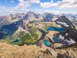 Rare and unique panoramic view from the Belly River Region of Glacier National Park, with snowy mountain range and lakes