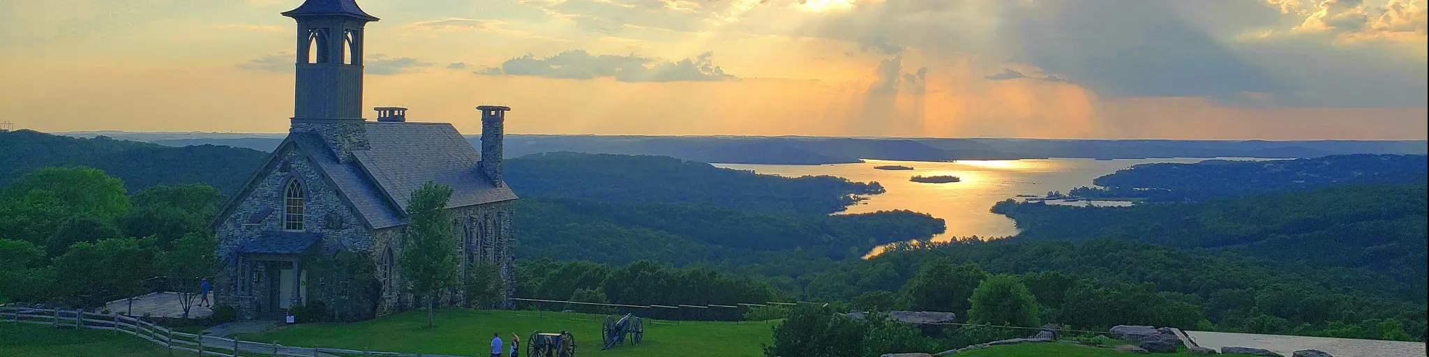 Chapel of the Ozarks in Branson, Missouri at Sunset with Table Rock Lake in the background.