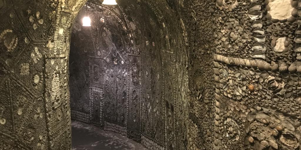 A shell-covered corridor in the underground Shell Grotto