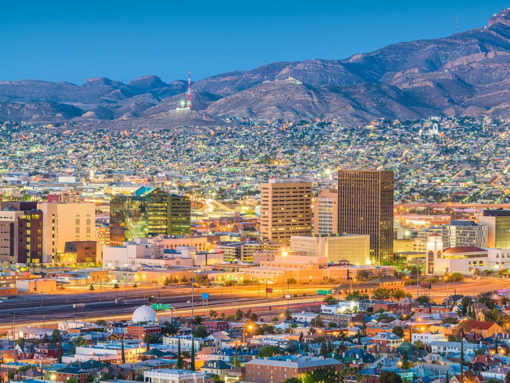 El Paso, Texas, USA downtown city skyline at dusk with Juarez, Mexico in the distance.