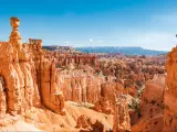 Bryce Canyon National Park, Utah on a crystal clear day with rugged red rock formations standing tall in the canyon