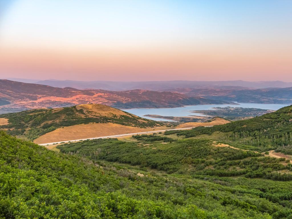 Jordanelle State Park in Utah, USA with a scenic view of the Jordanelle State Park and reservoir at sunset.