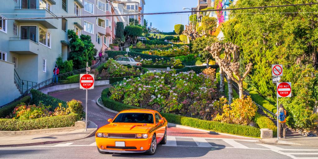 Car driving down the steep Lombard Street in San Francisco