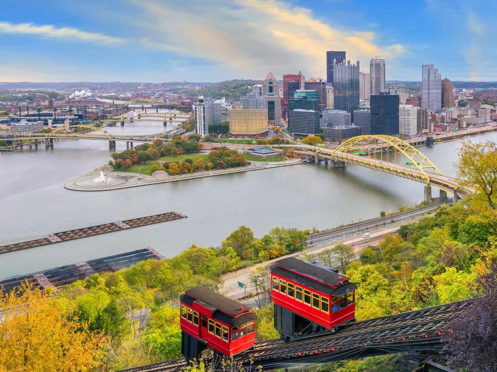 Pittsburgh, Pennsylvania, USA Downtown skyline of Pittsburgh, Pennsylvania at sunset in USA with the incline operating in the foreground.