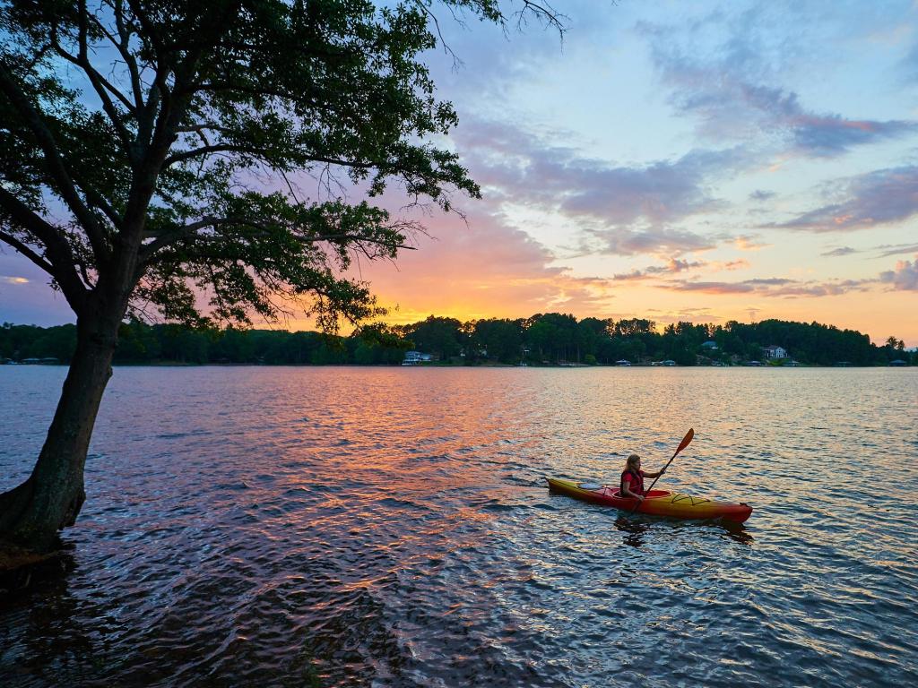 Female Kayaker on Lake Keowee at Sunset