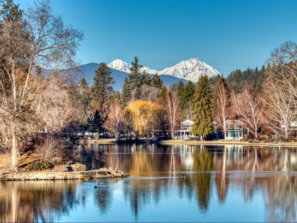 Mirror Pond view in Bend, Oregon along the Deschutes River. The photo is taken on a clear and crisp day.