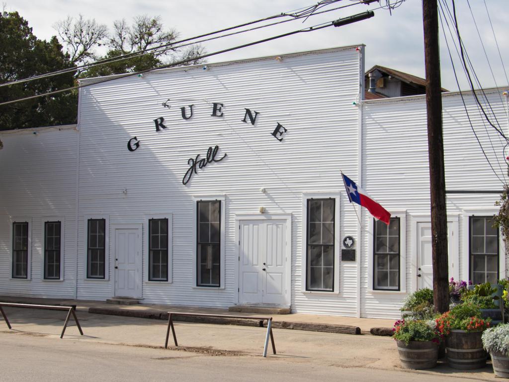 An image of the facade of Gruene Hall, which is the oldest continually operating dance hall in Texas built in 1878