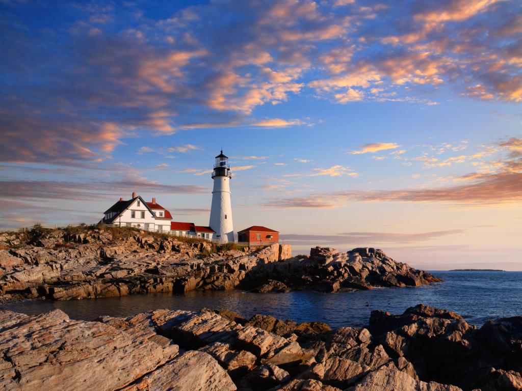 The Portland Head Light, Portland, Maine, USA taken at early morning with rocks in the foreground. 