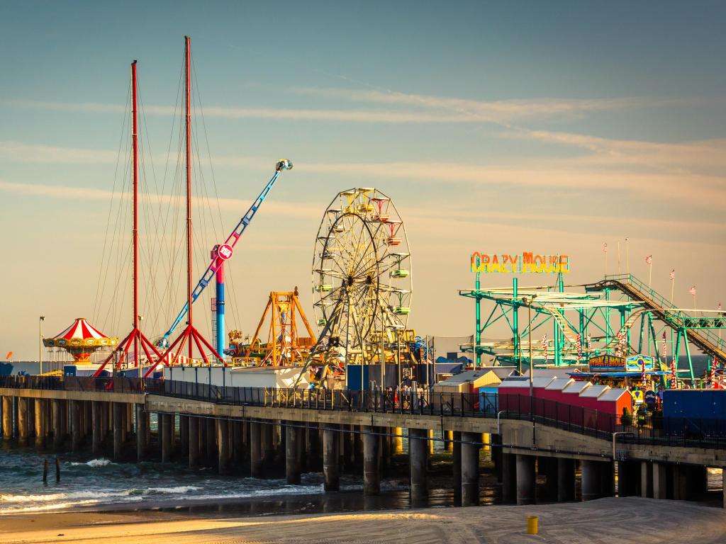 View of attractions and bright lights on The Steel Pier boardwalk at Atlantic City, New Jersey
