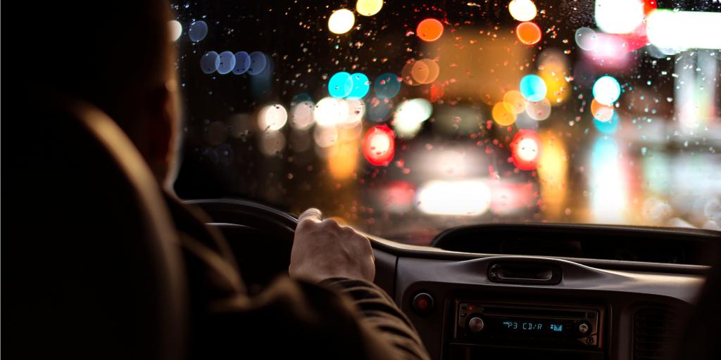 view through the windscreen of lights when driving at night 