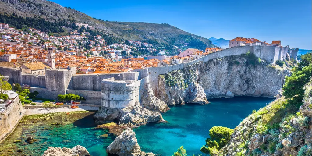 Aerial view of city walls along the waterfront in Dubrovnik, Croatia
