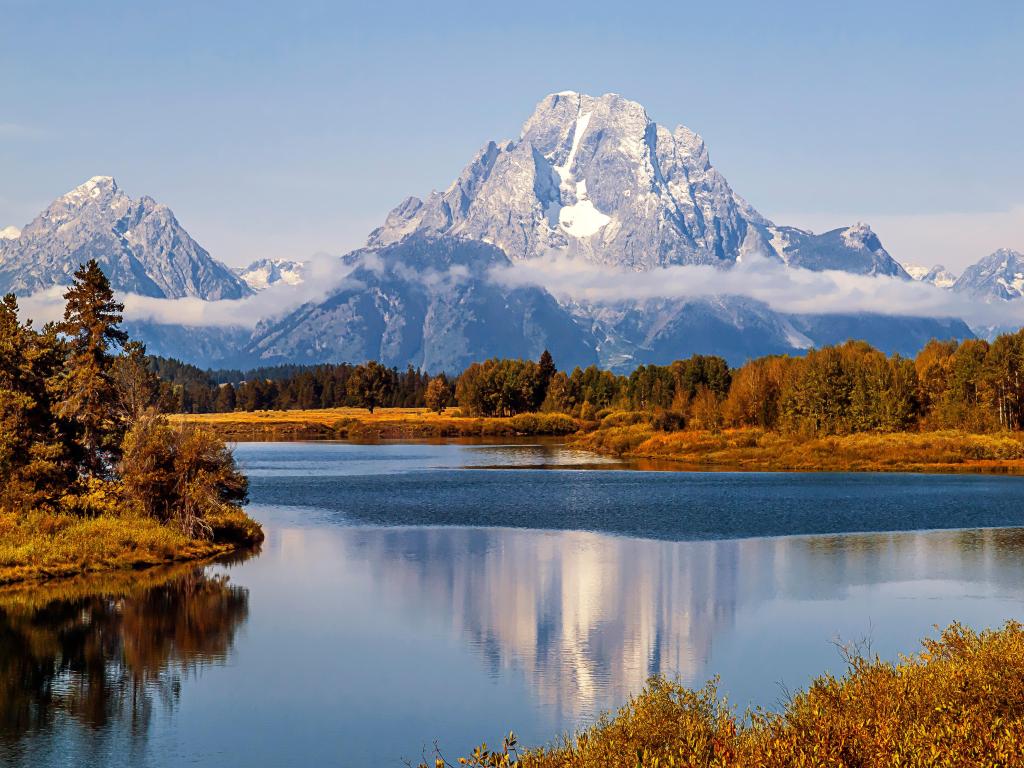 Mt. Moran, Grand Tetons National Park, USA at Oxbow band in Grand Tetons National Park and reflection in the river take during fall. 