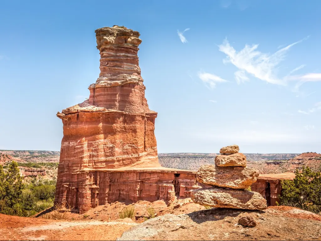 The famous Lighthouse Rock and a stone pile at Palo Duro Canyon State Park, Texas