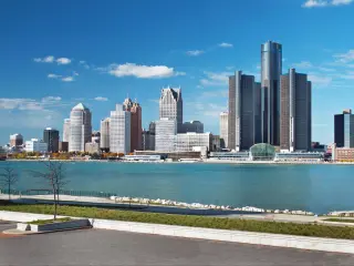Panoramic view of Detroit cityscape on beautiful sunny day, taken from Canada 