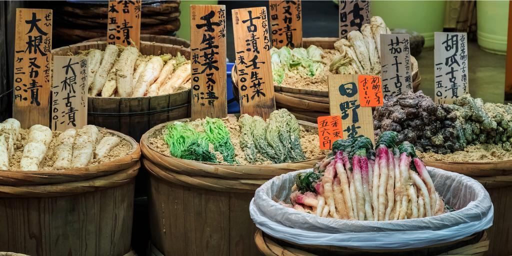 Vegetables on sale in baskets at  Nishiki Market, Kyoto