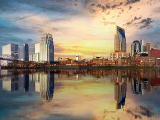 Nashville morning skyline with on a cloudy day with sun shining through