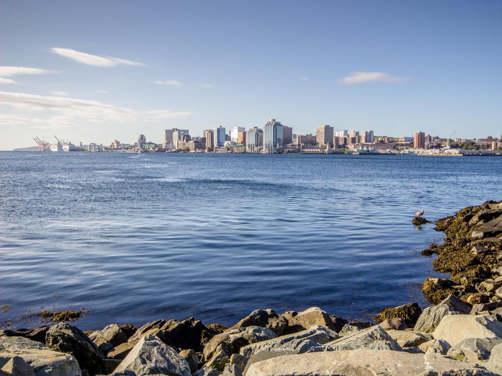 Halifax, Nova Scotia, Canada with the The Bluenose Schooner as seen from Dartmouth with Halifax skyline in the distance. 