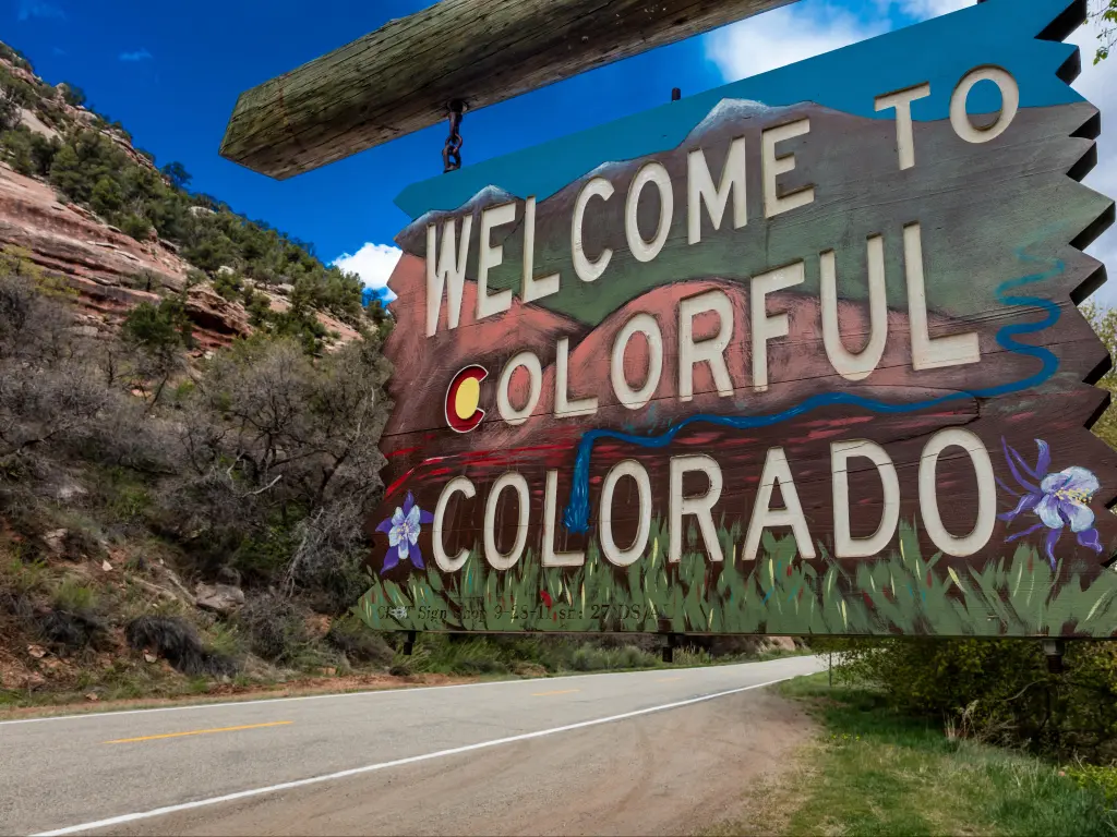 Welcome to Colorful Colorado State Road Sign near Utah Colorado border going towards Norwood Colorado
