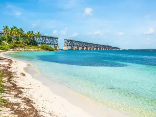 The view from the beach on a sunny day, on the broken railroad bridge in Key West