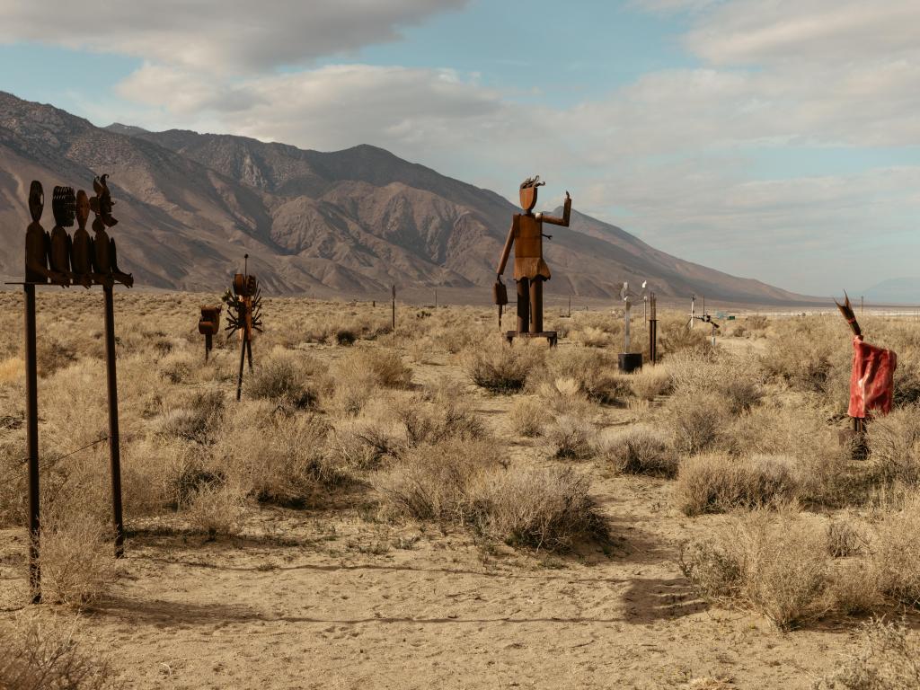 Sculptures in the desert by the roadside on a cloudy day