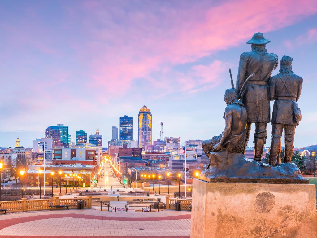 Des Moines Iowa skyline in USA with The Pioneer of the former territory statue