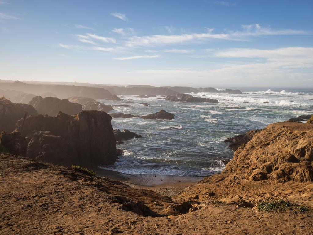 Fort Bragg, California, USA taken at Glass Beach with the Pacific Coast in the distance on a clear sunny day.