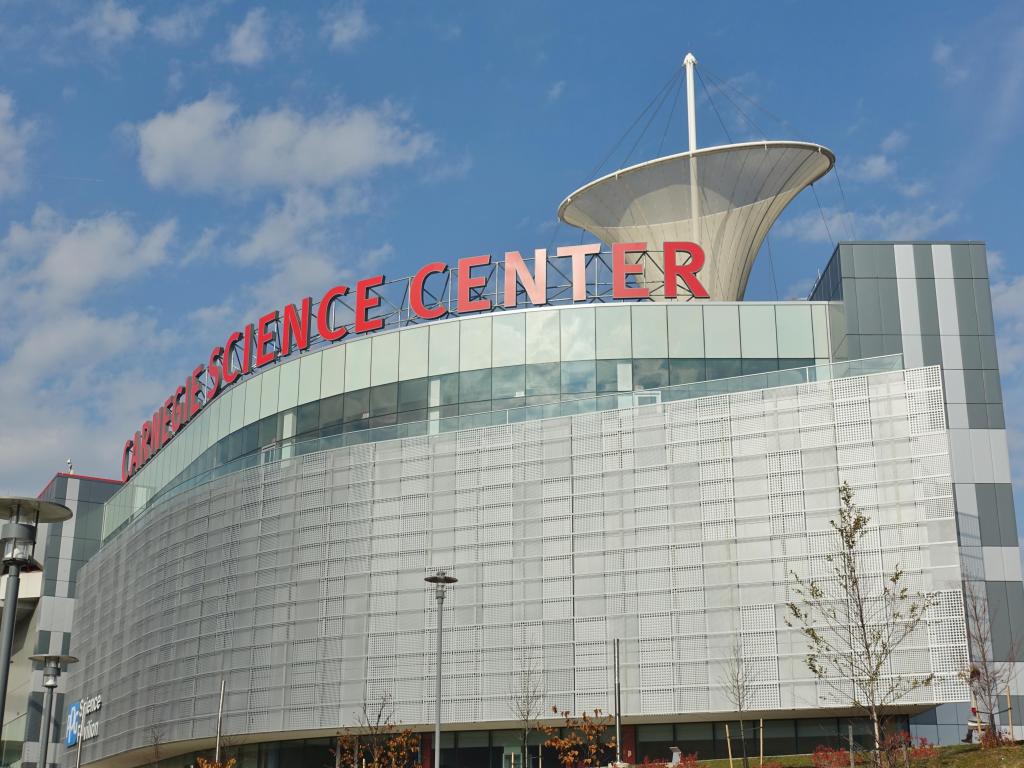 Facade view of the Carnegie Science Center on a sunny day