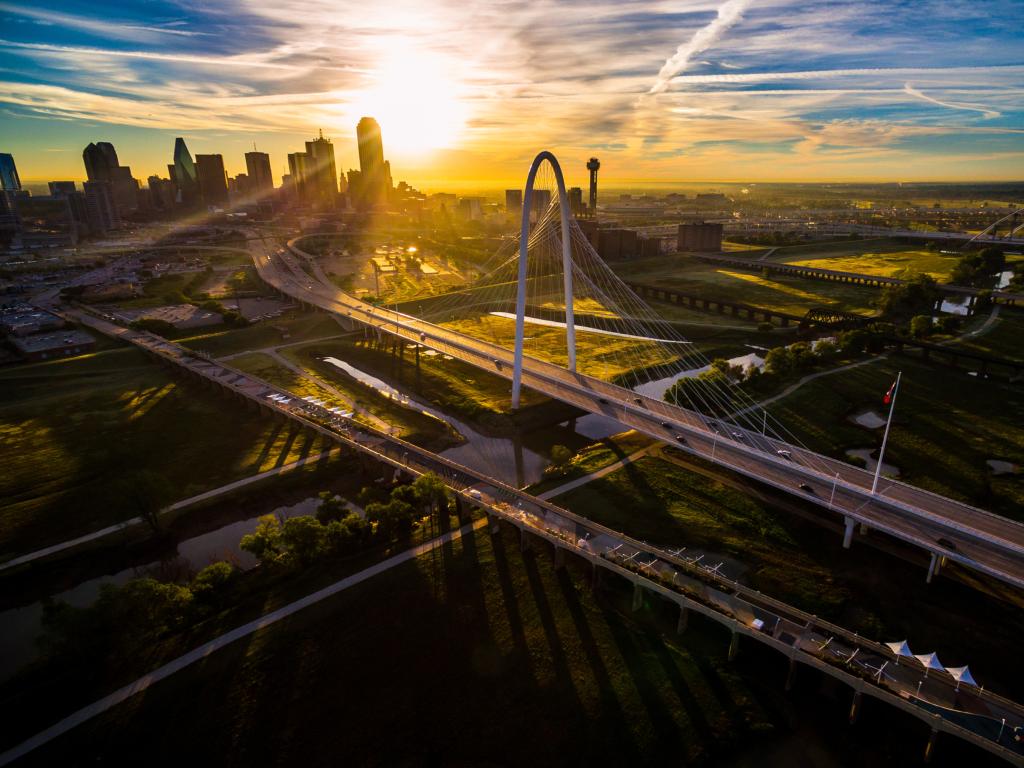 Margaret Hunt Hill Bridge with amazing views of downtown Dallas at sunset