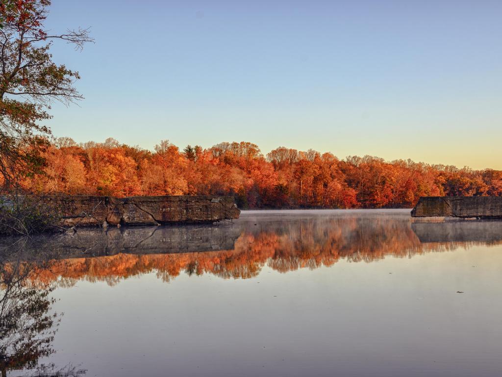 Autumn foliage along Farrington Lake from Bicentenial Park in East Brunswick, New Jersey.