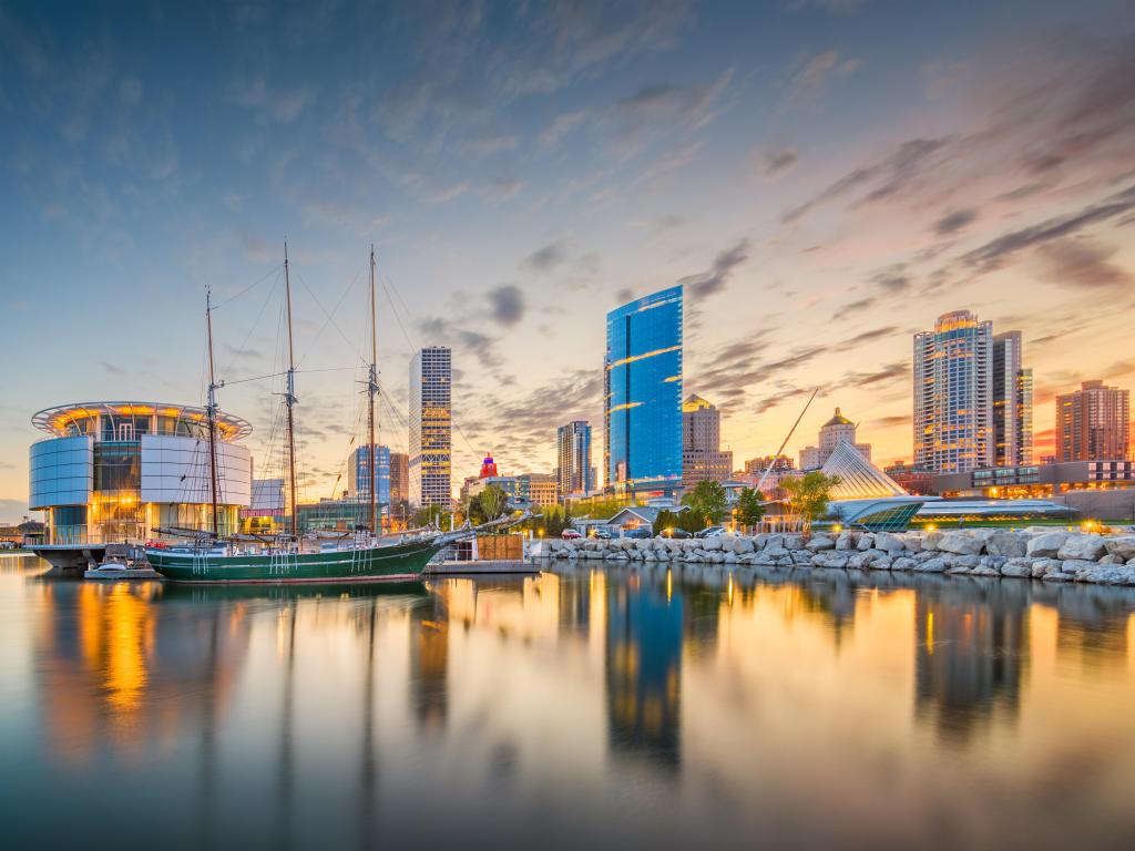 Milwaukee, Wisconsin, USA downtown city skyline on Lake Michigan at twilight.