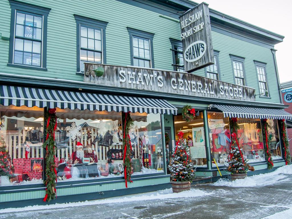 Festive traditional shop front on Main Street in Stowe, VT at Christmas time