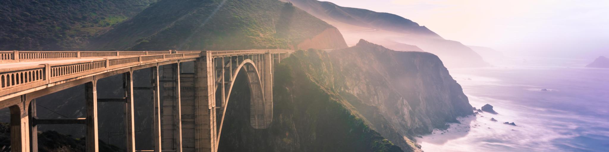 Beautiful view of the famous bridge from Big Sur direction with misty ocean in the distance