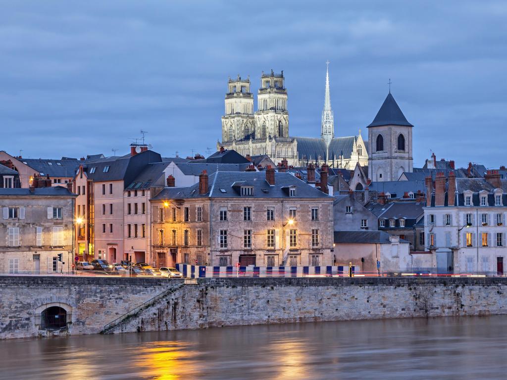 Embankment of Loire river and Orleans Cathedral in the evening, Orleans, France