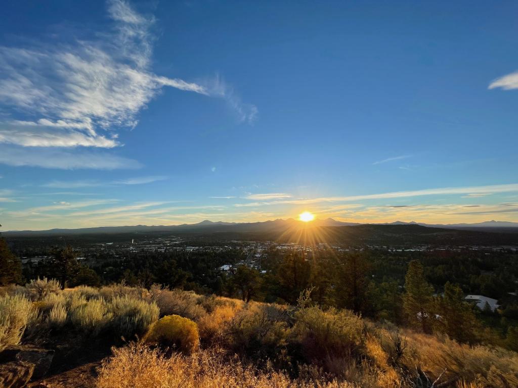 Sun setting over Pilot Butte State Park in Bend