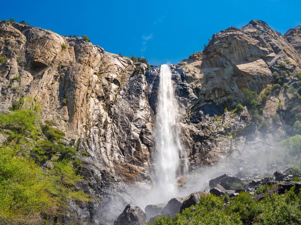 Yosemite Valley - Yosemite National Park, California, USA with a view of the iconic Bridalveil Falls on a sunny day.