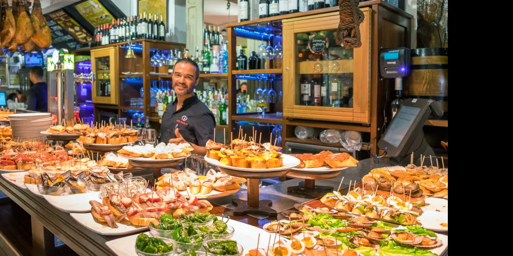 Pintxos being served in San Sebastian bar - Basque country in Spain
