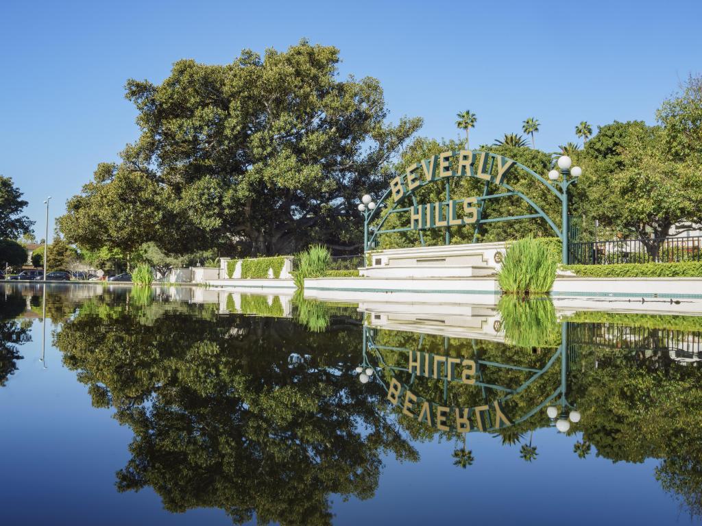 Famous Beverly Hills sign with its reflection on the water