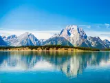 Grand Teton National Park, Wyoming. Reflection of mountains on Jackson Lake near Yellowstone.