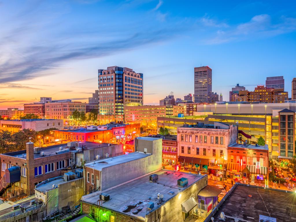 Memphis, Tennesse, USA downtown cityscape at dusk over Beale Street.