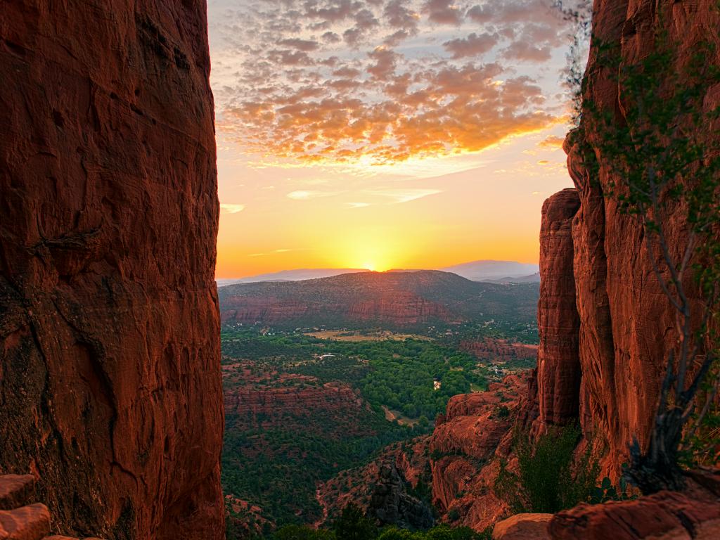 Sunset in the distance viewed from the Red Rocks of Sedona.