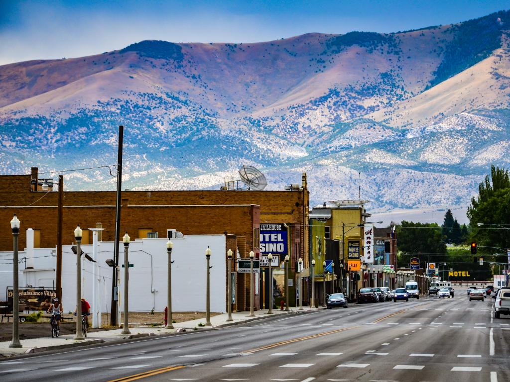Route 50, the main street in western town of Ely, Nevada is seen against backdrop of mountain range.